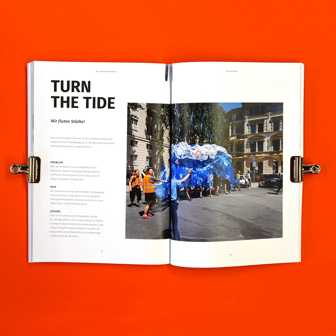Open spread “Turn the Tide” with a photo of the plastic wave, on orange