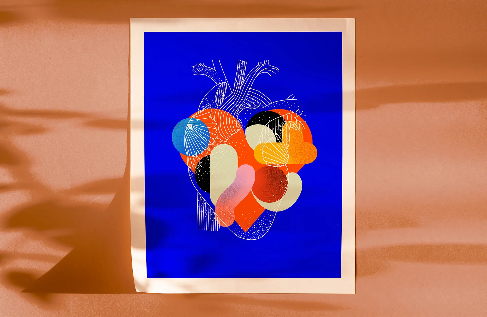 Print of a heart assembled from colourful shapes on blue